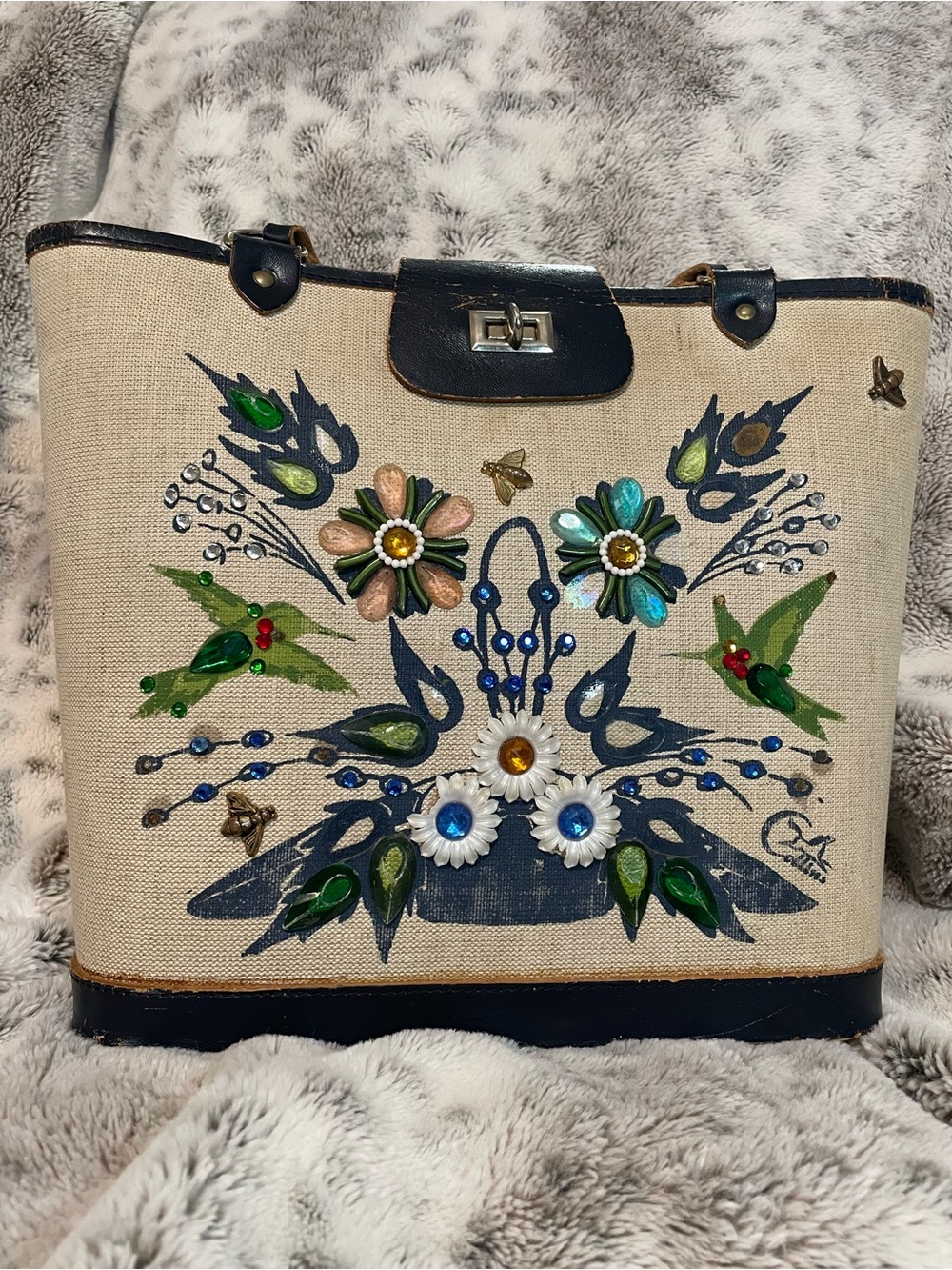 Enid Collin’s Floral Beige Canvas Shoulder Bag with black leather Trim.